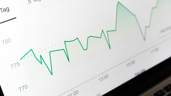 A collection of graphs and diagrams arranged on a page.