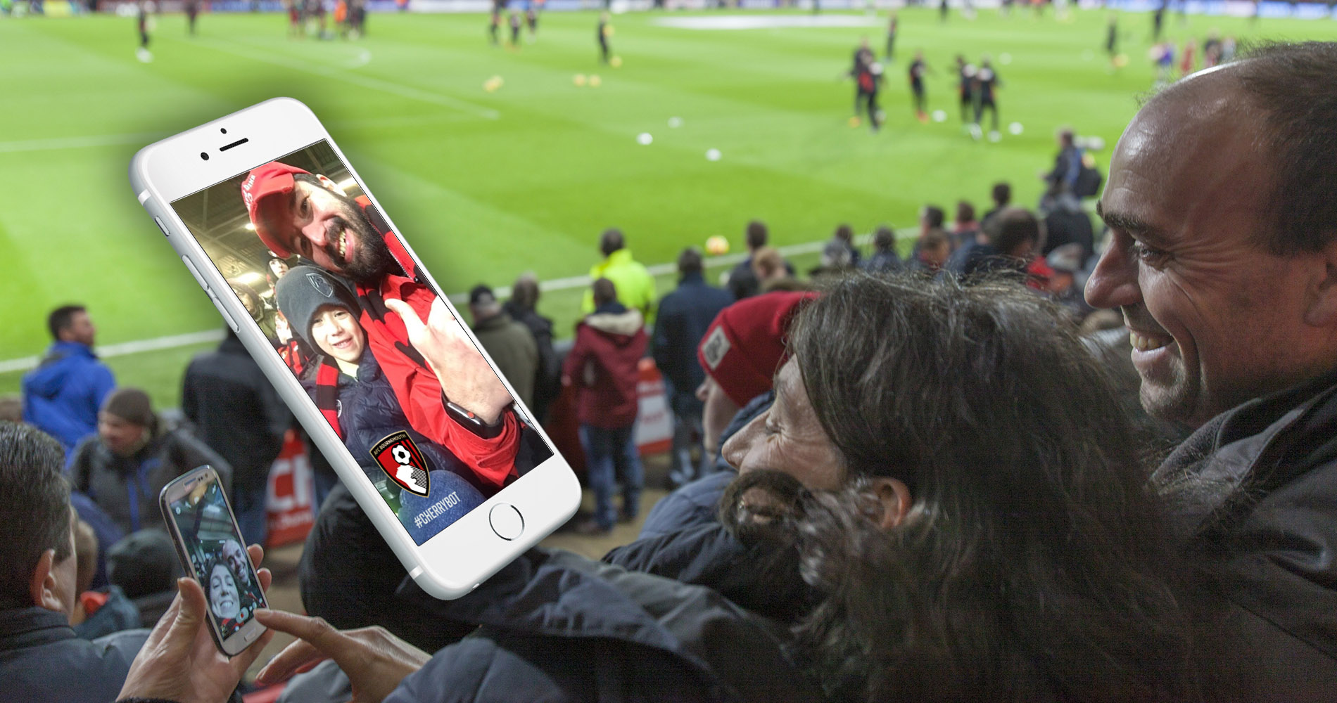 Image of footballs fans using a smart phone