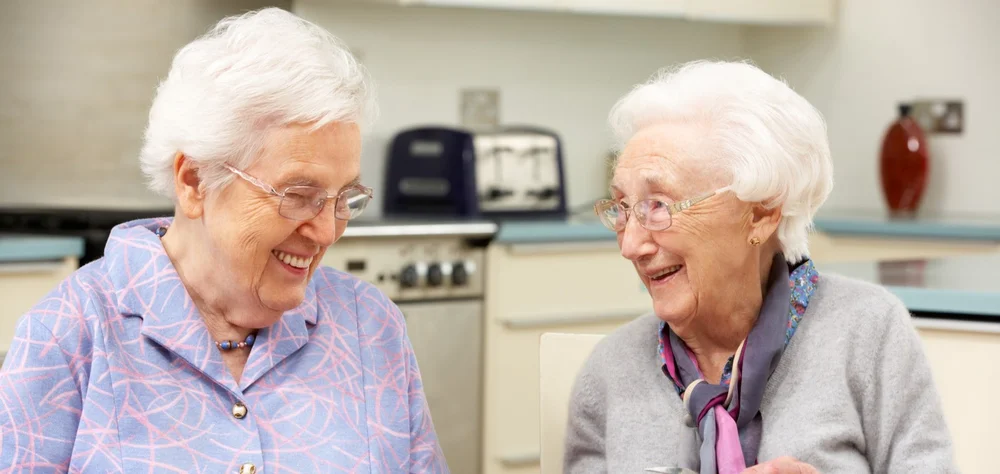 Smiling residents featured on the Abbeyfield listing page
